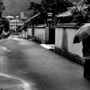 Umbrella in rainy street