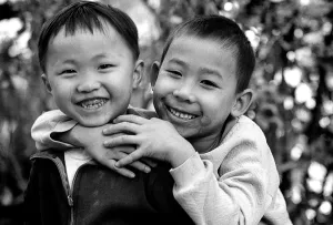 Two boys smiling happily