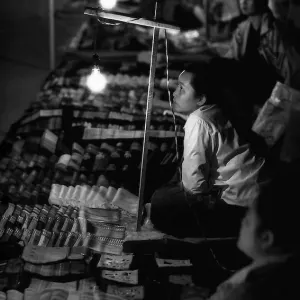 Woman working in night market