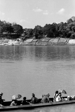 Narrow river ferry on Mekong river
