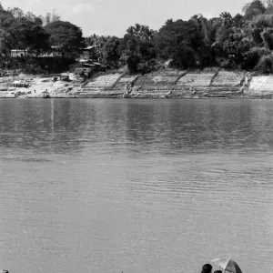 Narrow river ferry on Mekong river