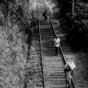 People walking on railway track
