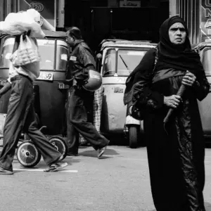 Woman walking with chador