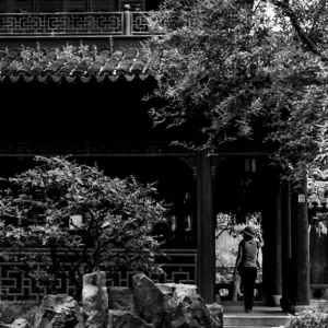 Woman taking a walk in Yuyuan garden