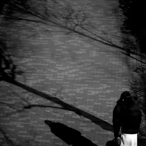 Couple standing on sidewalk