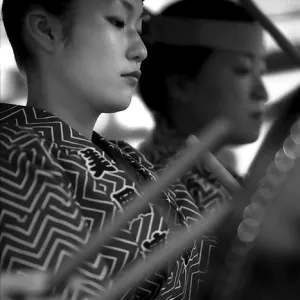 Young woman drumming