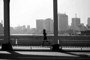 Man running on bridge
