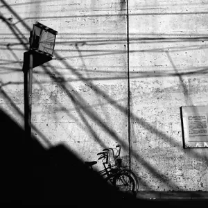  Bicycle propped against wall