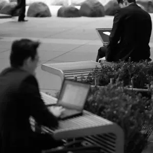 Businessmen working outside