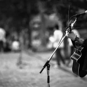 Man singing with guitar