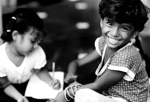 Smiling girl and studying girl