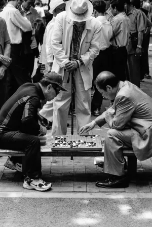 Men Playing Go in park