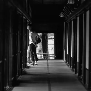 Couple at end of corridor