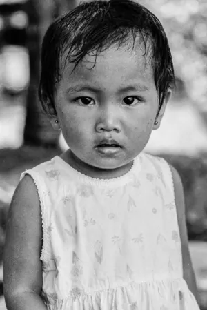 Little girl wearing pierced earrings