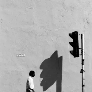 Shadow of traffic signal on wall
