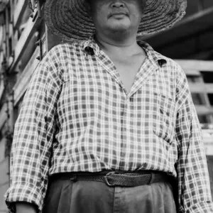 Man wearing straw hat