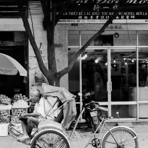 Rickshaw man sitting on seat