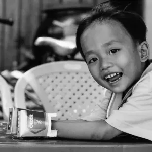 Boy putting hands into empty box