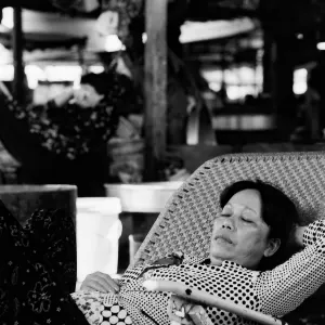 Woman taking nap in market