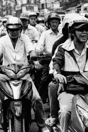 Motorbikes running street in Ho Chi Minh