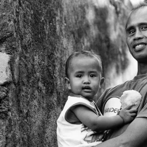 Father holding son