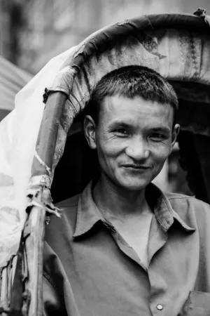 Rickshaw man smiling