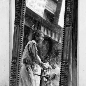 Man being reflected in mirror