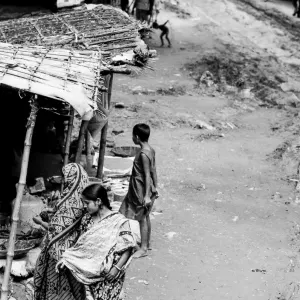 Woman walking unpaved road