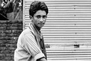 Rickshaw man interested in camera
