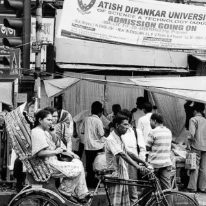Cycle rickshaw waiting at stop light