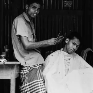 Barber cutting hair