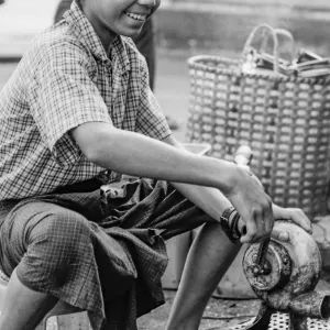 Boy working with screw wrench