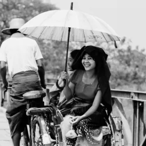 Woman smiling on pedicab