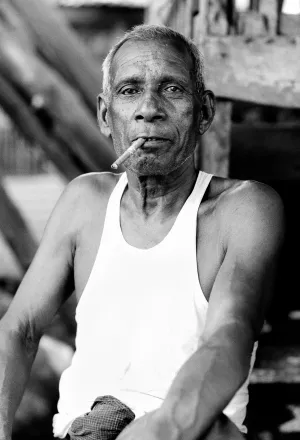 Man puffing on a cigar