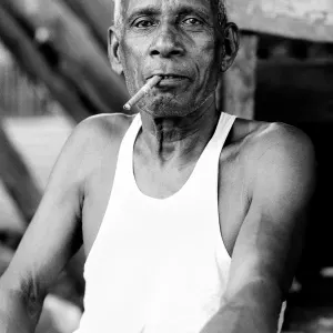 Man puffing on a cigar