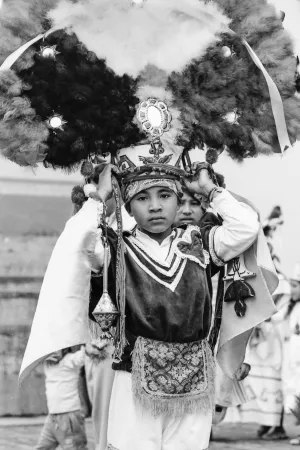 Boy wearing a decorative cap