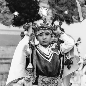 Boy wearing a decorative cap