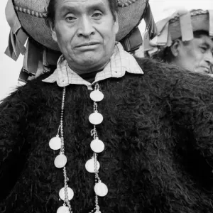 Man wearing an ethnic costume like poncho
