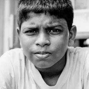 Boy frowning