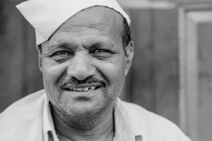 Man giving bitter laugh