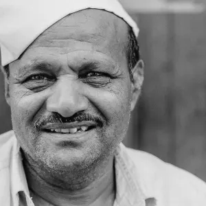 Man giving bitter laugh