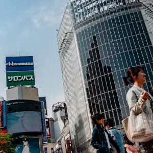 Women walking with bag in Shibuya