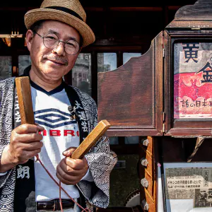 Man playing picture-card show