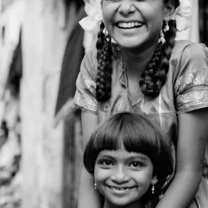 Girl with bobbed hair and girl with braid