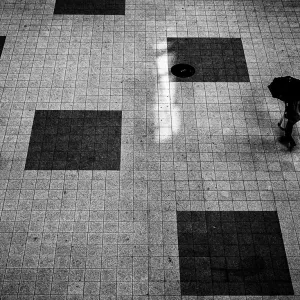 Umbrella walking between squares