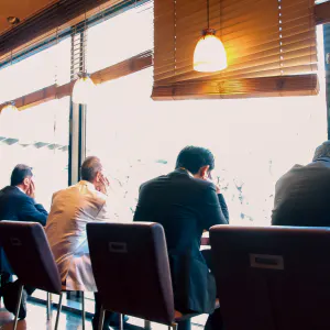 Businessmen in a cafe