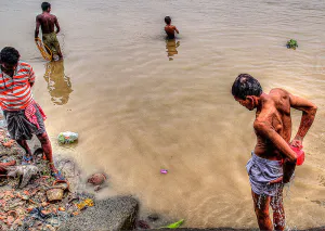 People soaking in Hooghly River