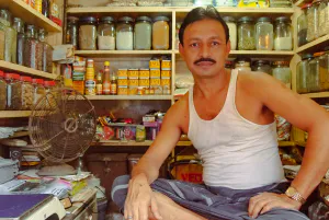 Man working in spice shop