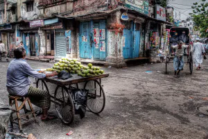 Mango seller and rickshaw