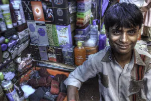 Young man working in street stall